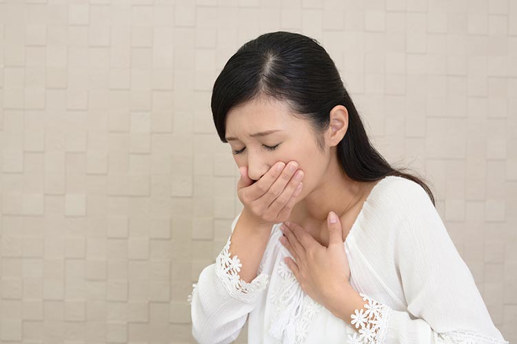 吐き気のイメージ写真
